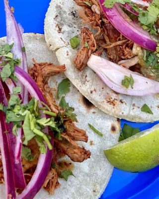  Cochinita Pibil: สัมผัสความนุ่มละลายในปากของหมูอบและรสชาติเผ็ดร้อนจากพริกไทยยูคาแทน!