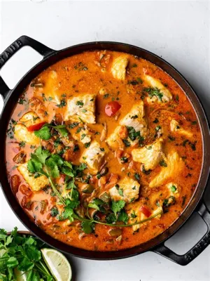  Moqueca!  A Brazilian Seafood Stew Bursting with Aromatic Spices and the Freshness of the Sea