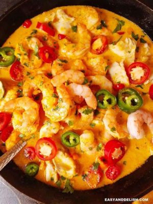  Moqueca! A Rich and Flavorful Seafood Stew Simmering with Coconut Milk and Spicy Peppers